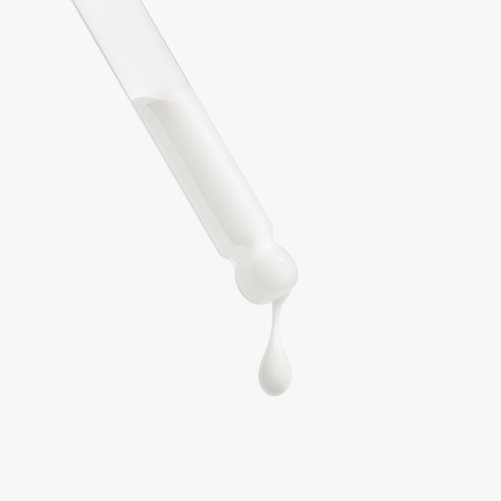 Ixora Life Retinol and Peptide Face Serum — close-up of the serum texture on a dropper