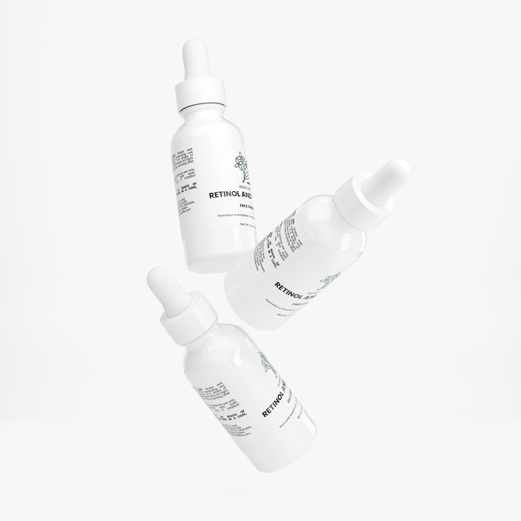Ixora Life Retinol and Peptide Face Serum — arrangement of three white serum bottles
